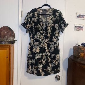 Black flowered Wrap style Baby Doll dress Non- wrinkle